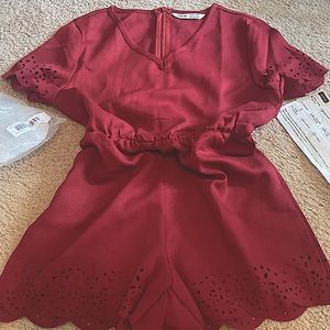 Girls solid scallop trim romper!